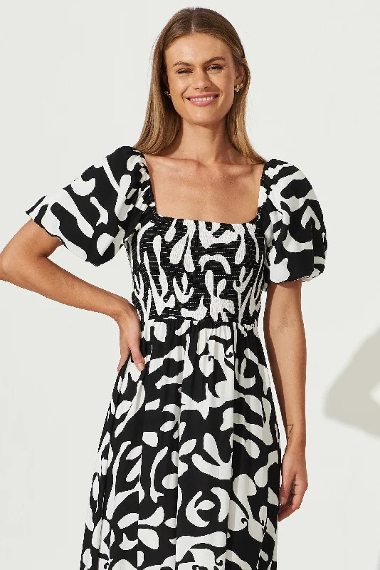 mariam-midi-dress-in-black-with-white-print