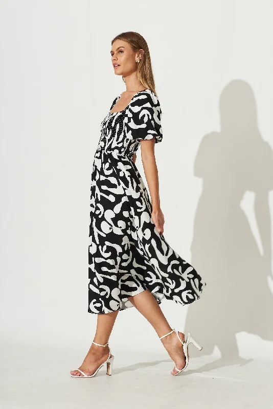 mariam-midi-dress-in-black-with-white-print