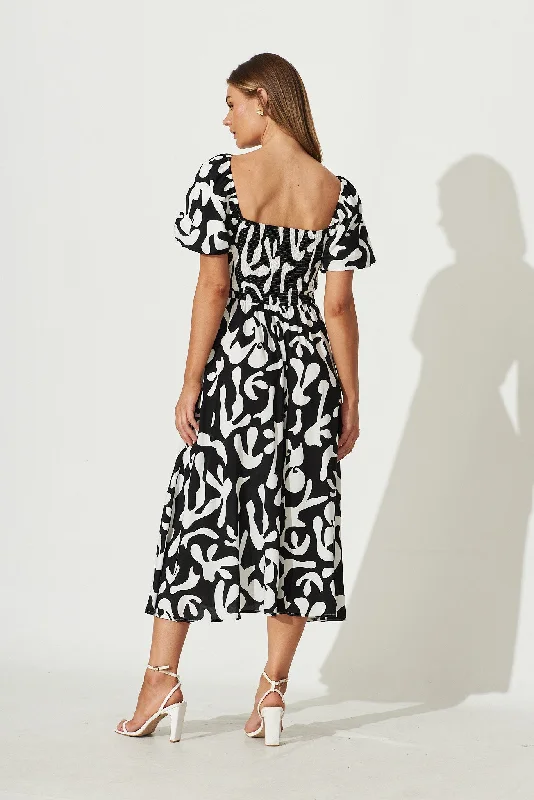 mariam-midi-dress-in-black-with-white-print