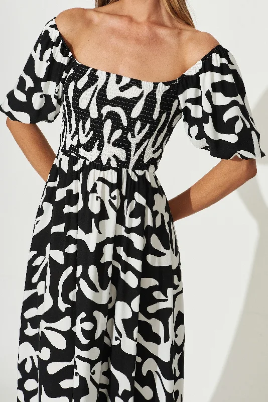 mariam-midi-dress-in-black-with-white-print