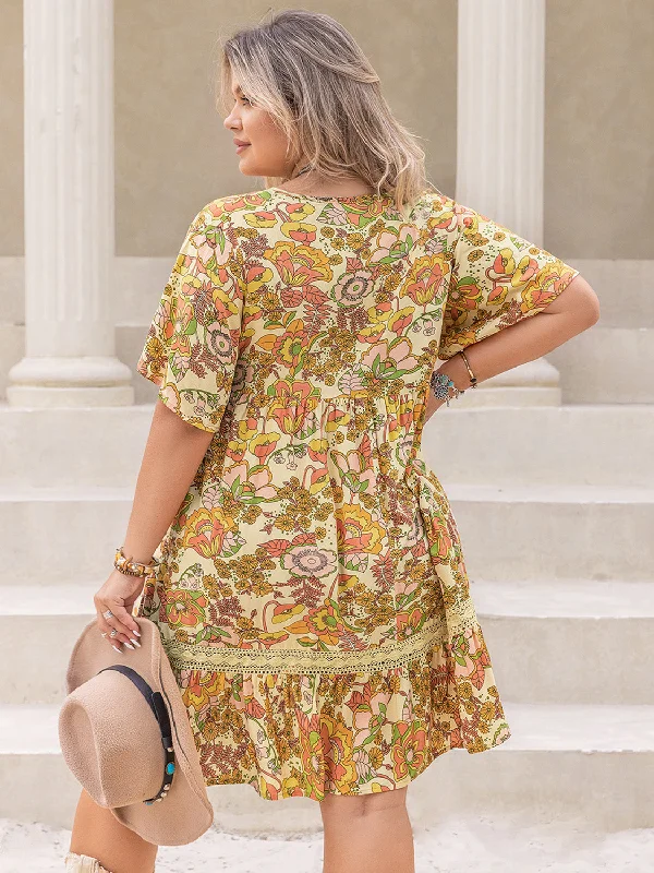 plus-size-printed-tie-neck-short-sleeve-mini-dress