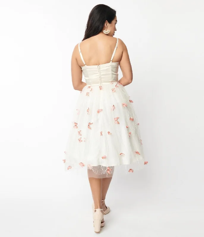 unique-vintage-ivory-butterfly-bertie-swing-dress