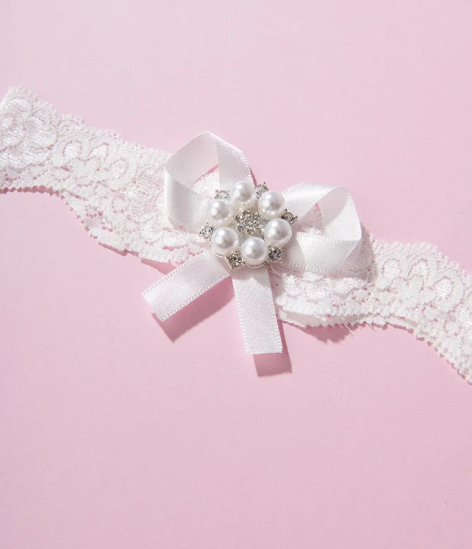 white-lace-rhinestone-bridal-garter-set